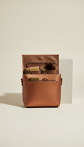 Burnished copper compact crossbody bag